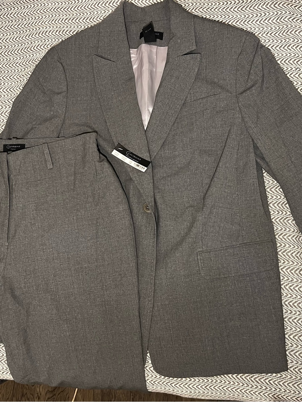 Context Woman’s classic gray suit Blazer and Trousers